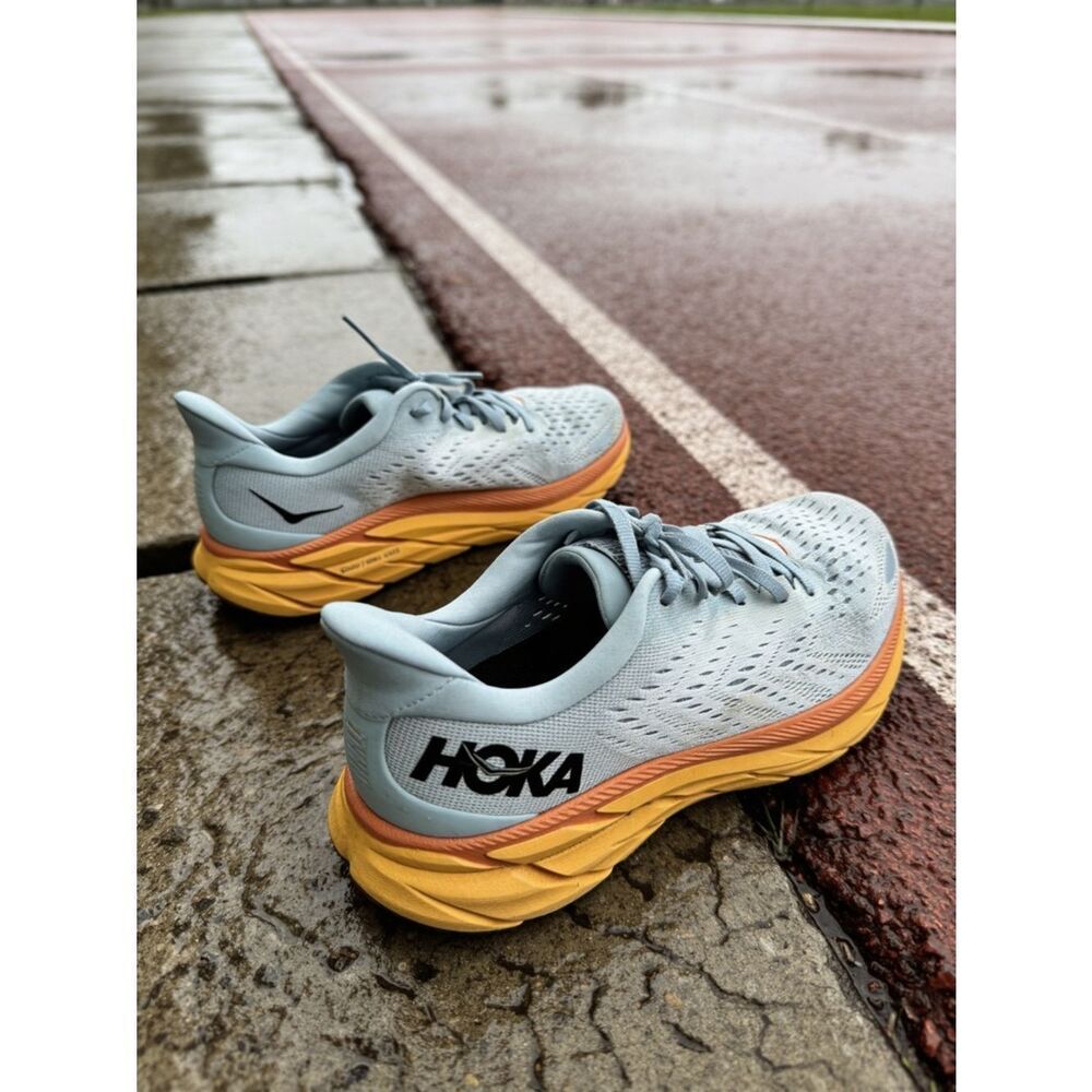 Hoka women’s Light Blue and orange Cushioned Running Shoes size 9